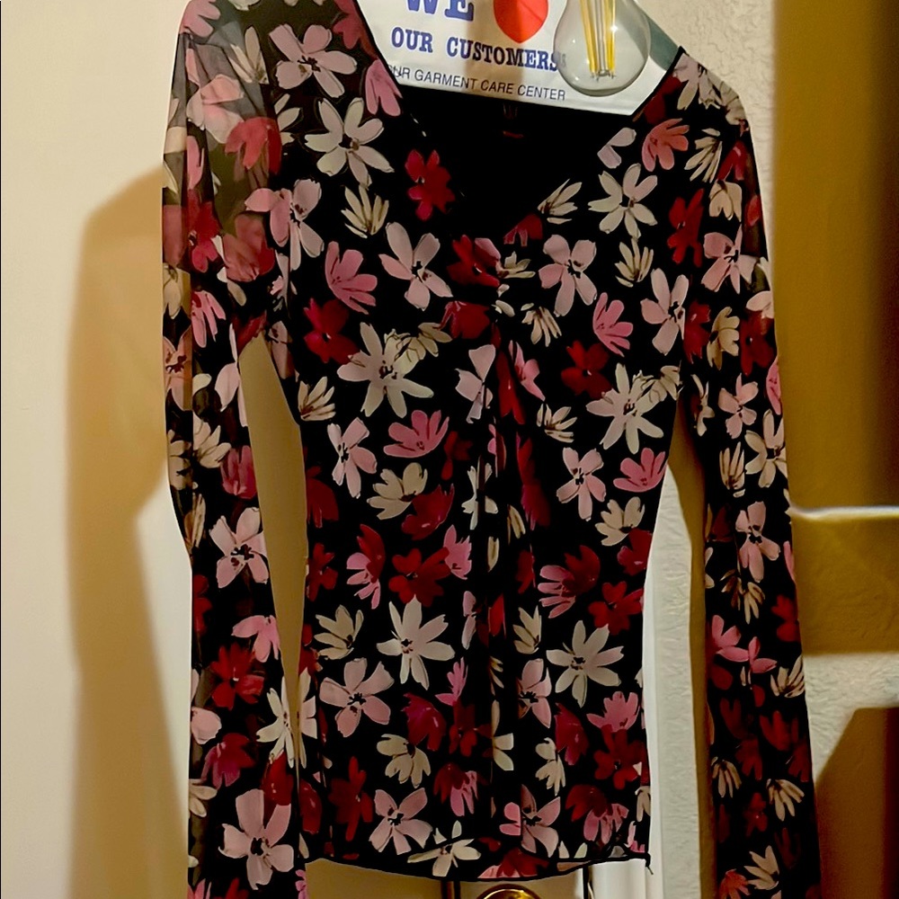 Fitted blouse size small black and floral pinks